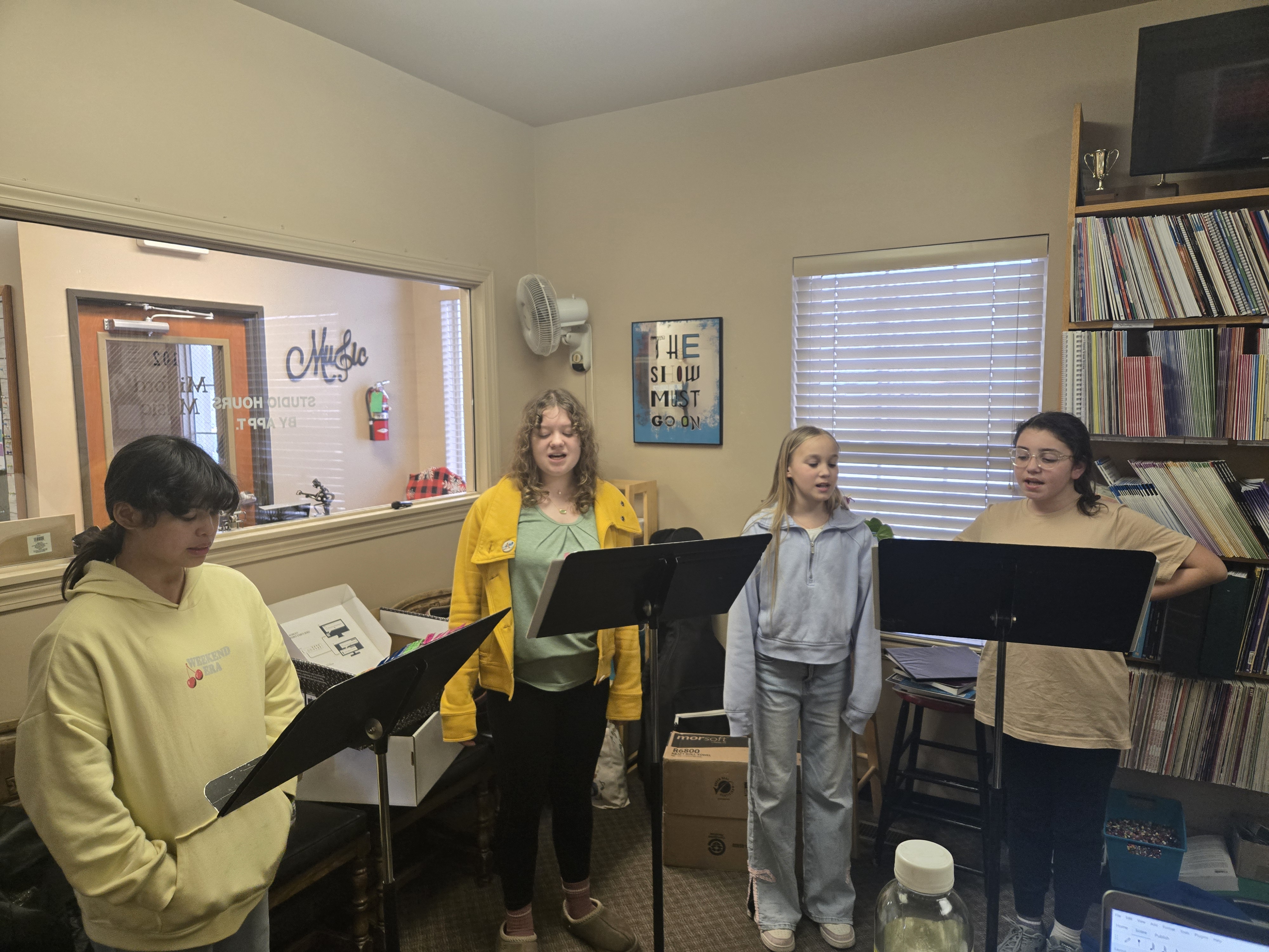 Students rehearsing together in the studio